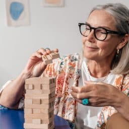 Senior woman working on a puzzle.