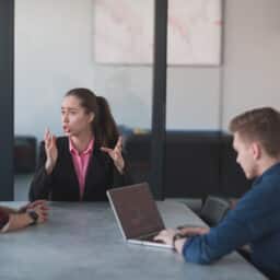 Man using captioning software in a meeting