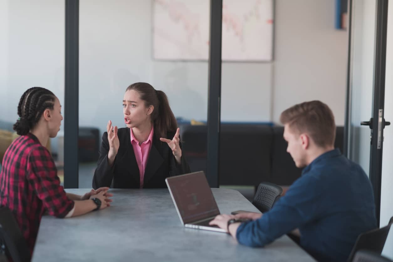 Man using captioning software in a meeting.